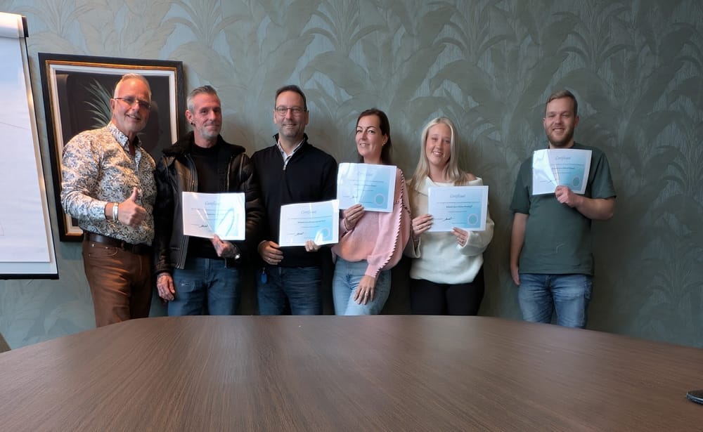 Teamfoto tijdens een in-company cursus